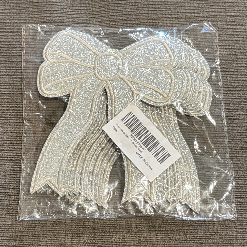 Shiny silver glittery bow iron on patches 10 pack